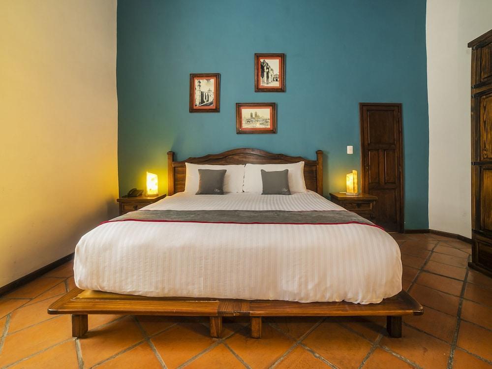 Hotel Collection O Al Otro Lado Del Rio, Puebla de Zaragoza Esterno foto A bedroom at the hotel