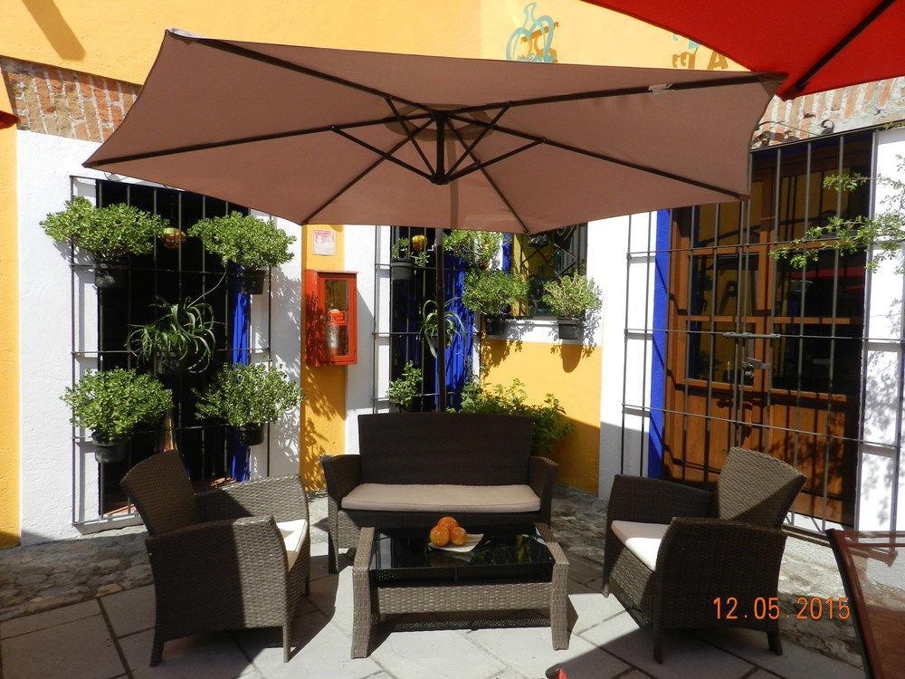 Hotel Collection O Al Otro Lado Del Rio, Puebla de Zaragoza Esterno foto A patio in Mexico City