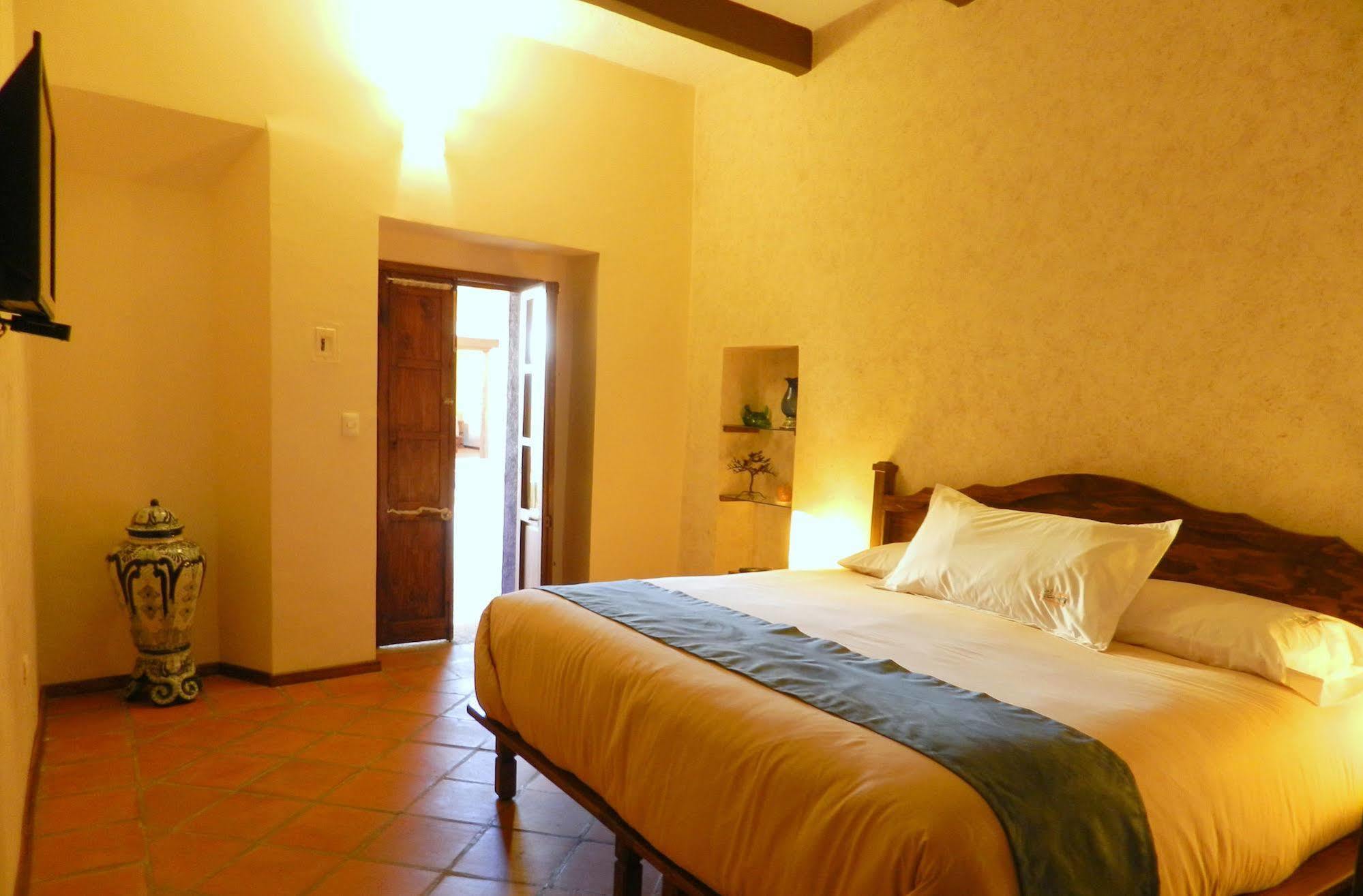 Hotel Collection O Al Otro Lado Del Rio, Puebla de Zaragoza Esterno foto A room at the hotel