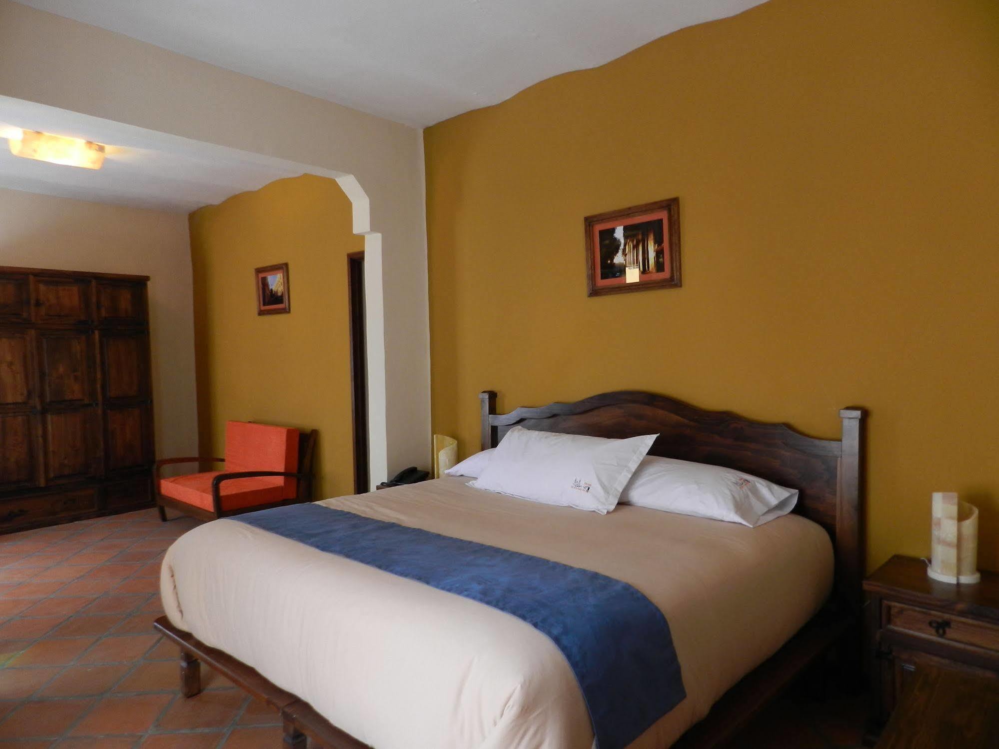 Hotel Collection O Al Otro Lado Del Rio, Puebla de Zaragoza Esterno foto A bedroom at the hotel