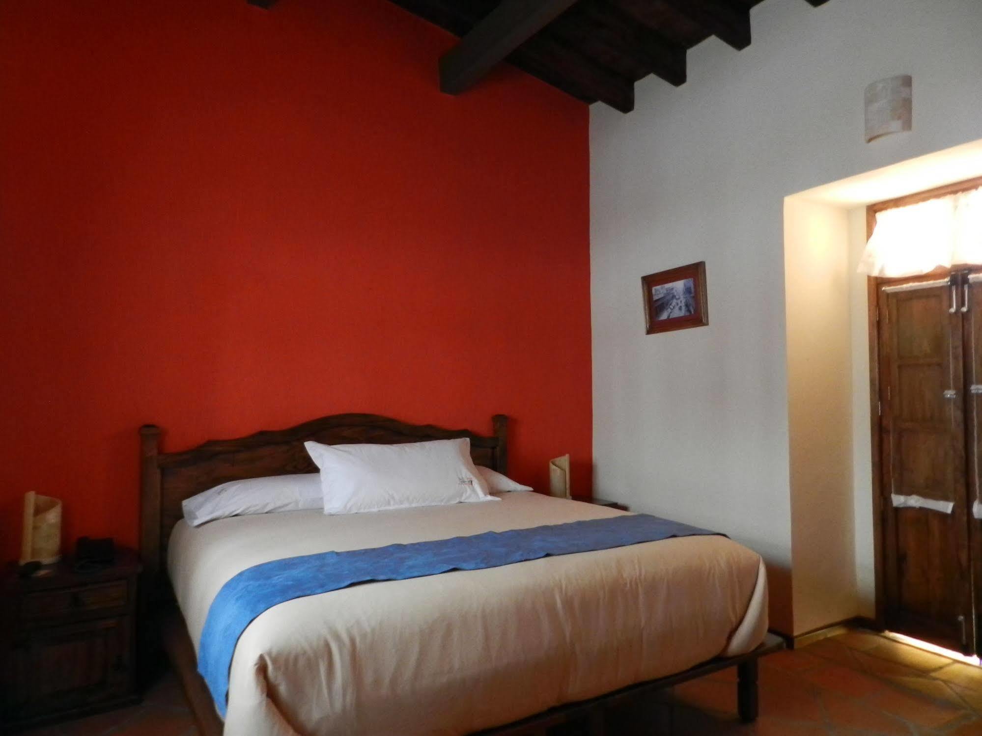 Hotel Collection O Al Otro Lado Del Rio, Puebla de Zaragoza Esterno foto A room at the hotel