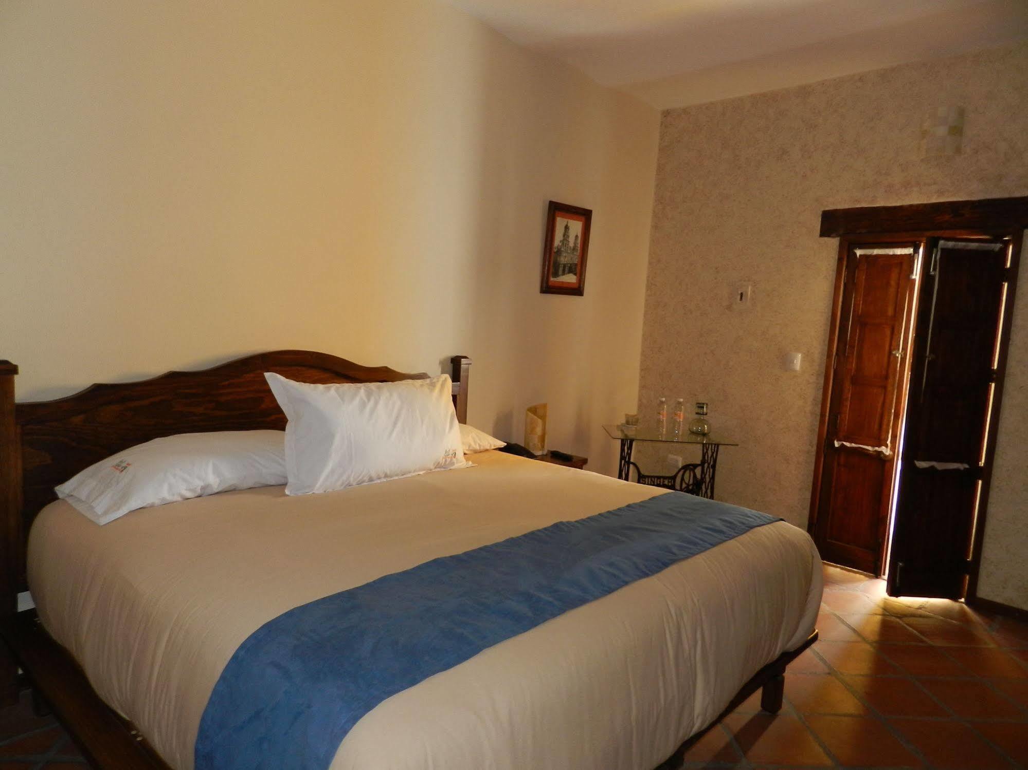 Hotel Collection O Al Otro Lado Del Rio, Puebla de Zaragoza Esterno foto A bedroom at the hotel