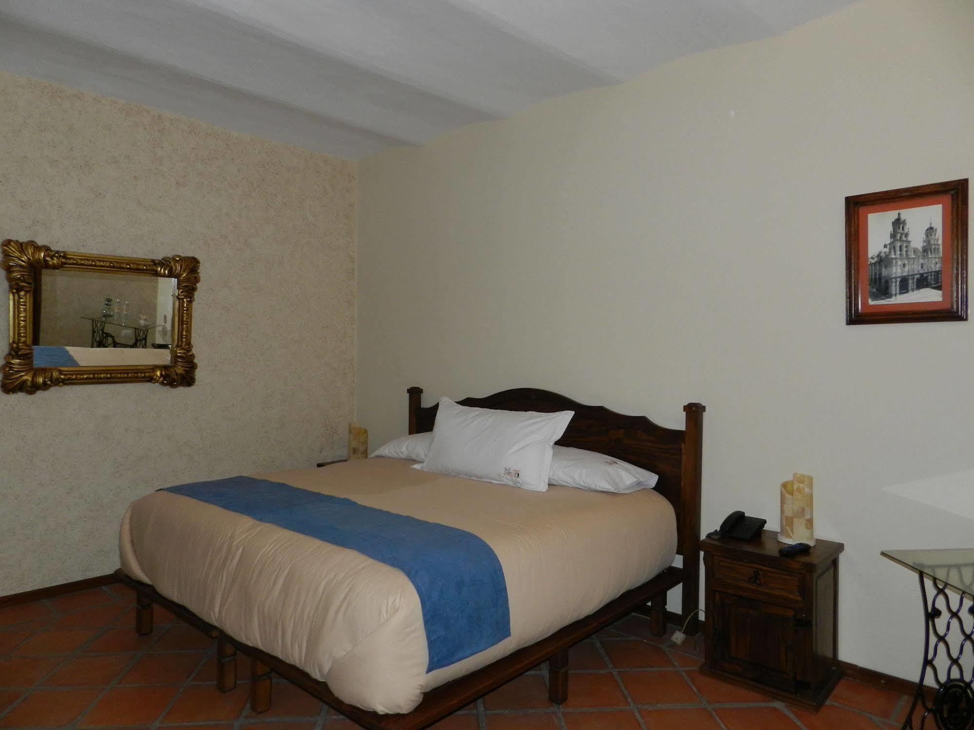 Hotel Collection O Al Otro Lado Del Rio, Puebla de Zaragoza Esterno foto A room at the hotel